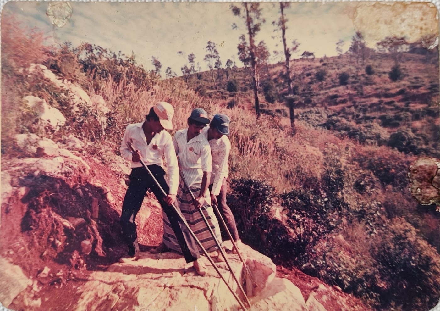Workers at a raw quartz extraction site